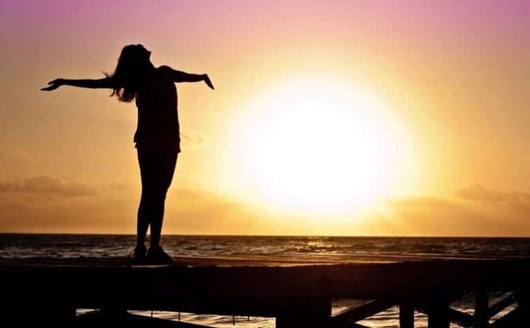 girl on the beach at dawn