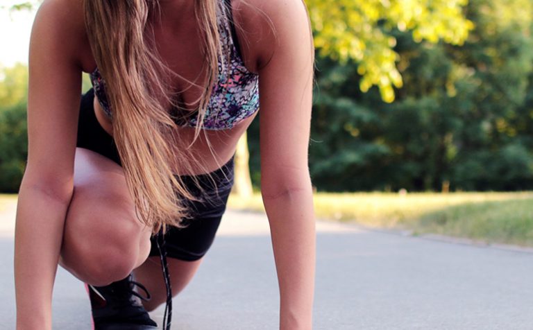 Womens health, lady about to start running